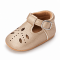 Baby Cut Out Mary Jane Shoes Beige variant image - Beige baby cut out Mary Jane shoes with decorative perforations, buckle strap and soft flexible baby sole.