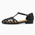 Black womens T bar woven ballet flats side view with ankle strap