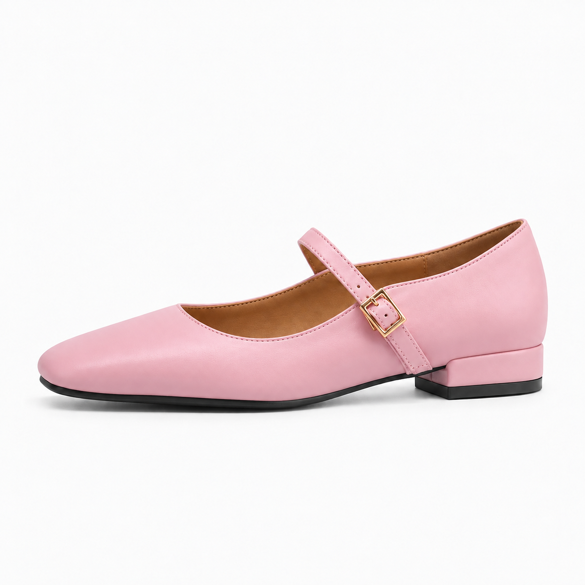 Pink square toe ballet flats - studio side view. Premium studio side view of pink square toe Mary Jane ballet flats with slim strap, gold buckle, tan lining and black outsole.