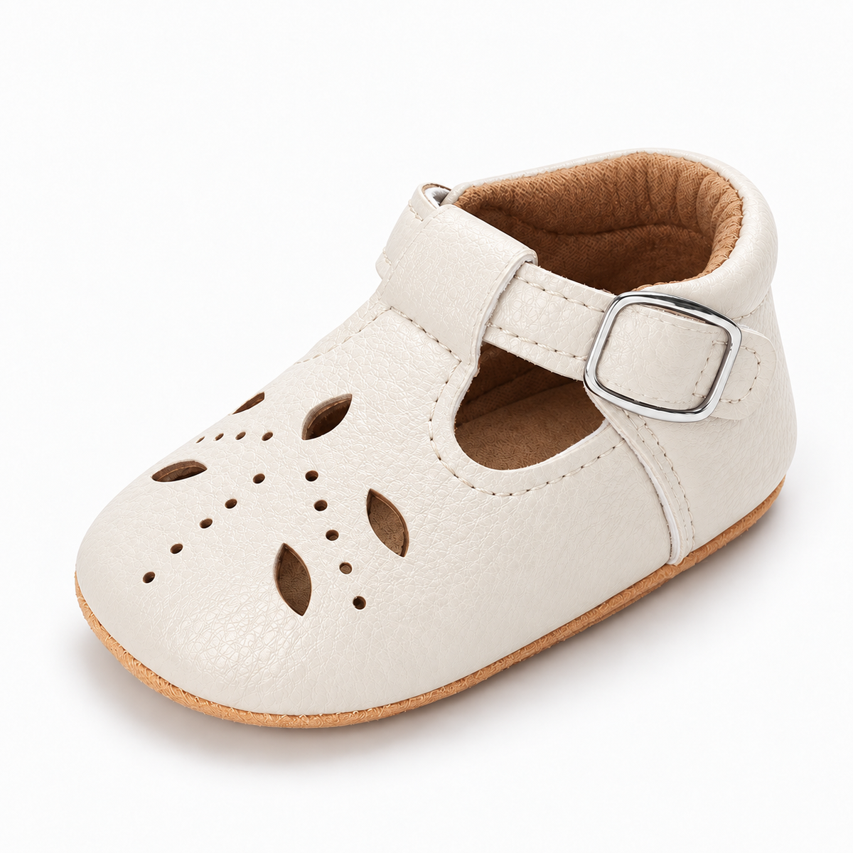 Baby Cut Out Mary Jane Shoes White variant image - White baby cut out Mary Jane shoes with visible leather texture, cut out upper, silver buckle and tan sole.