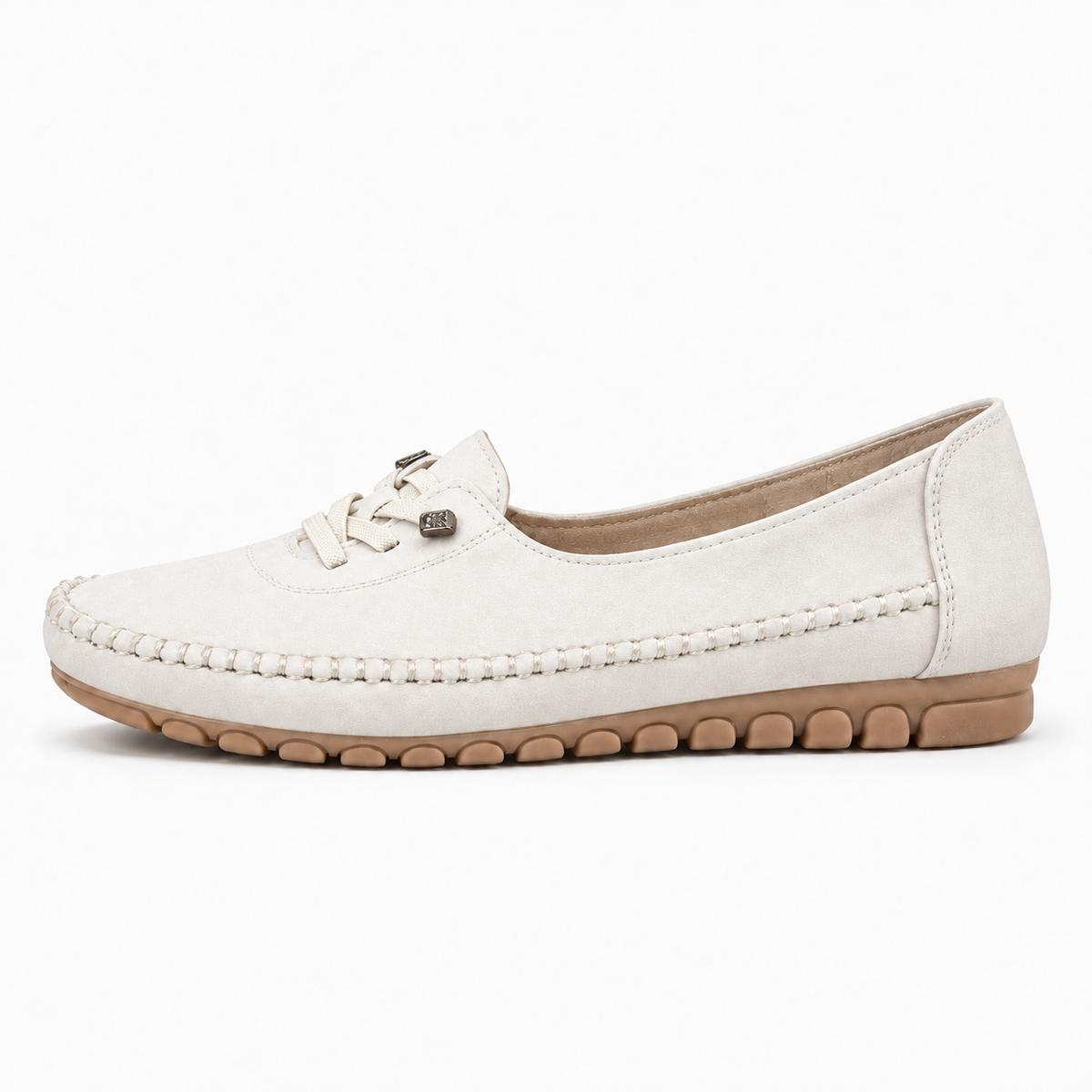 White womens soft round toe comfort loafers, clean side profile with cushioned flexible tan sole