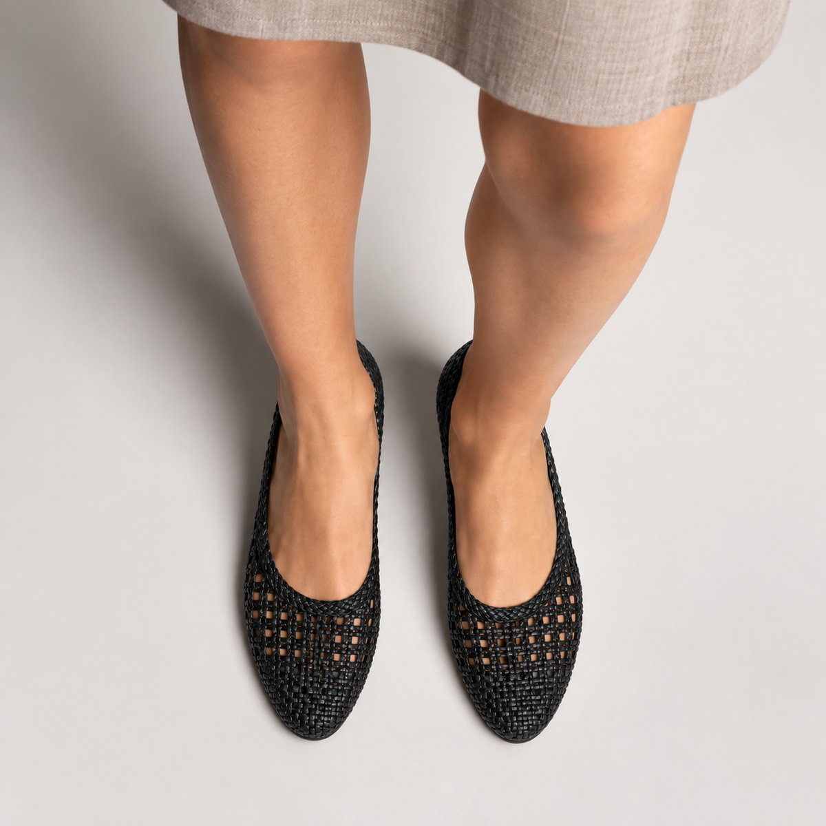 Womens Woven Mesh Ballet Flats worn with elegant skirt - premium breathable black flats