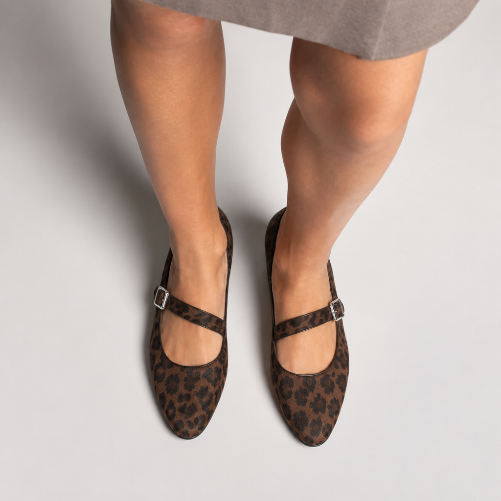 Womens leopard print buckle Mary Jane flats worn with strap