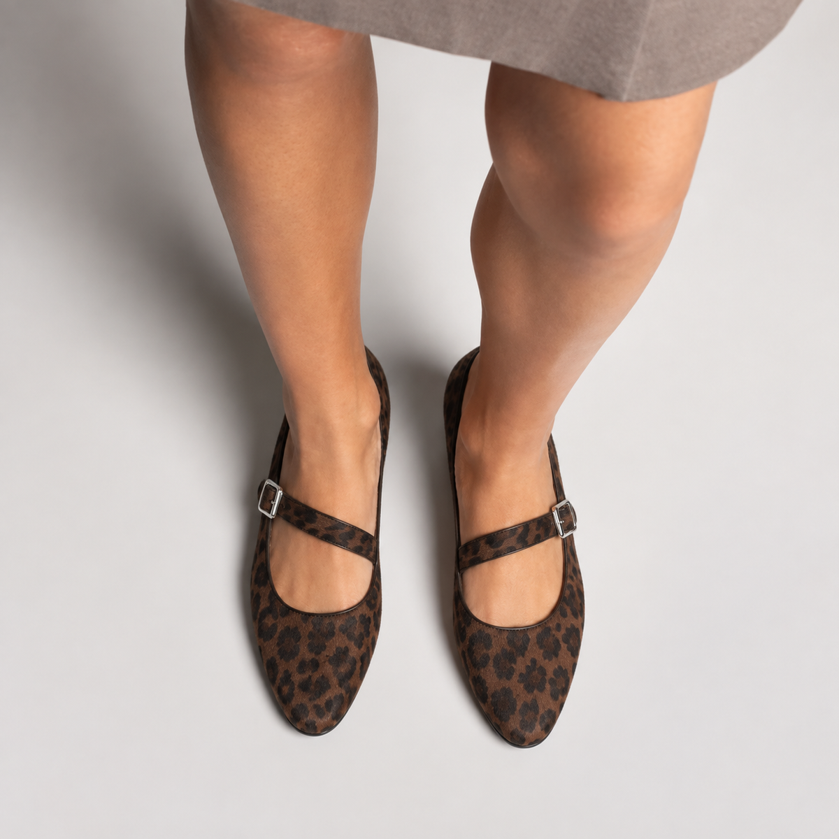 Womens leopard print buckle Mary Jane flats worn with strap