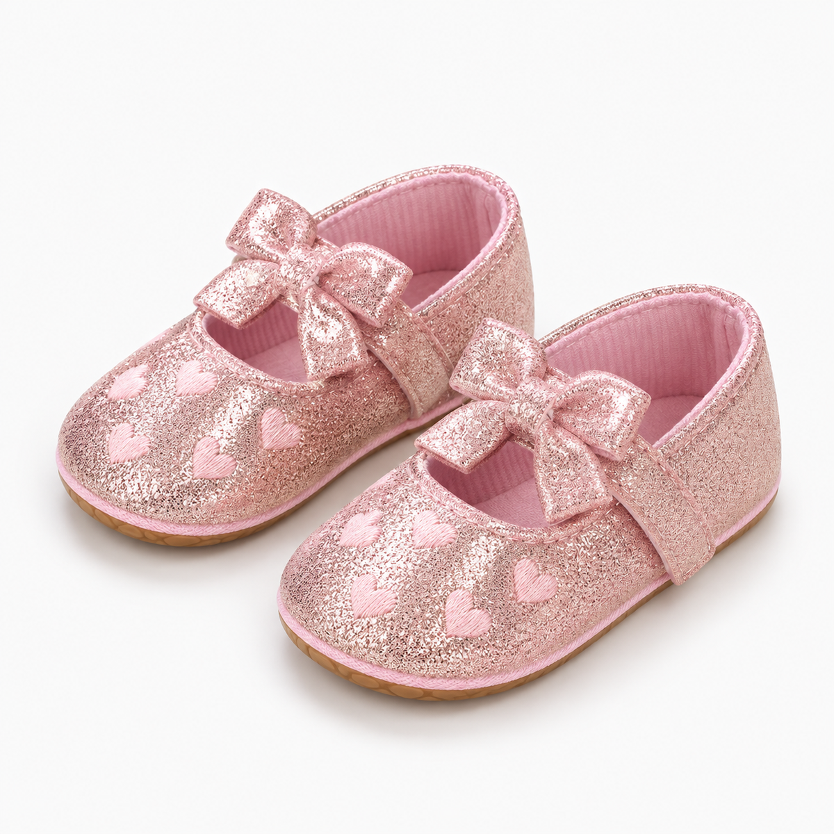 Pink Baby Heart Bow Mary Jane Shoes pair - metallic baby shoes with heart details and flexible sole
