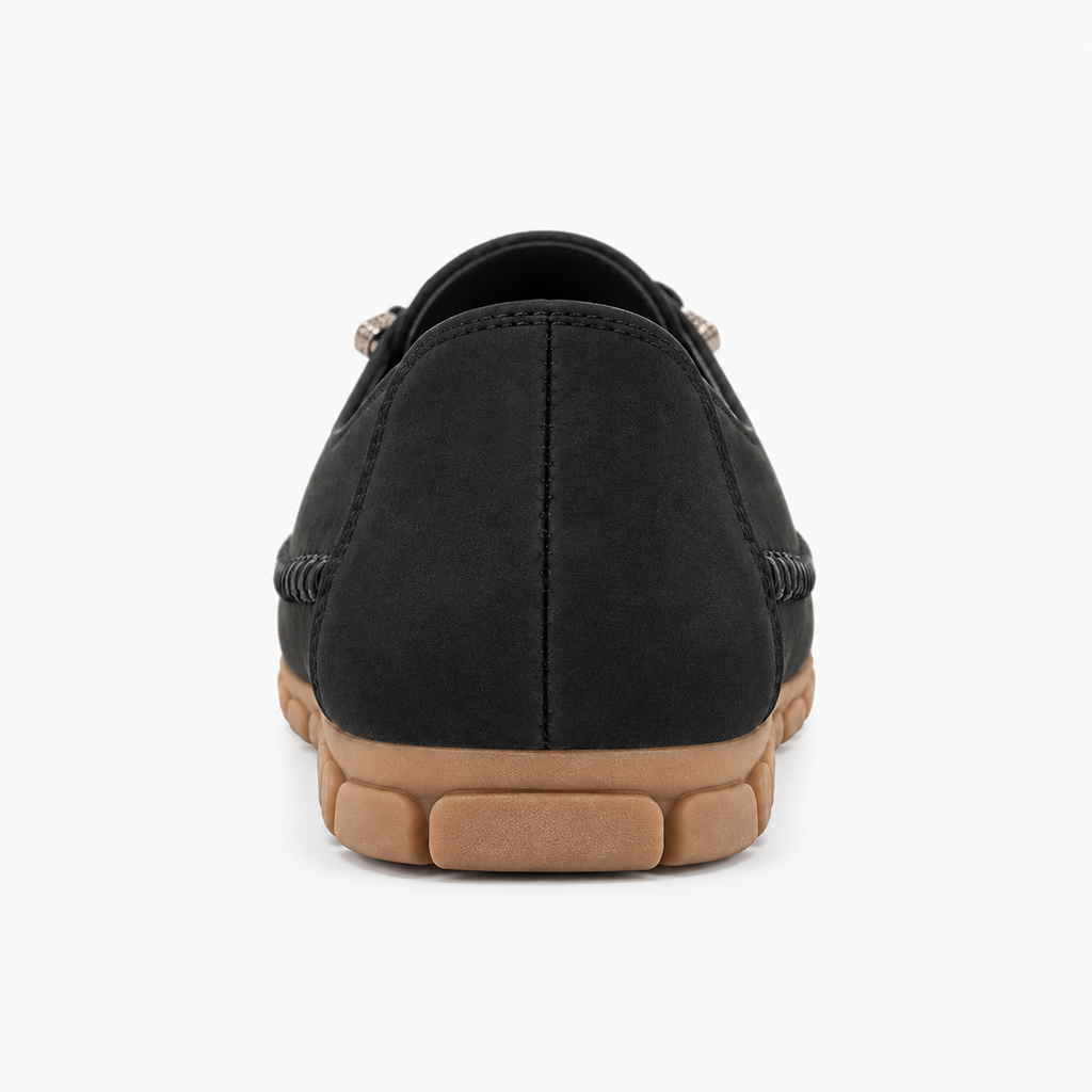 Black womens soft round toe comfort loafers rear view, low flexible sole and cushioned heel design