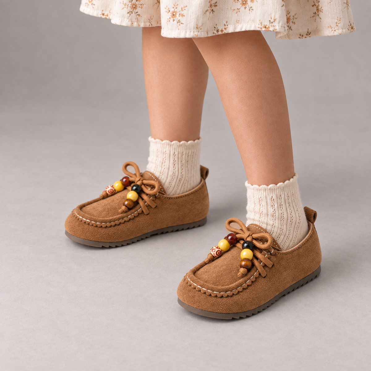 Girl wearing Kids Soft Sole Retro Loafers Brown - premium children shoe studio lifestyle photo