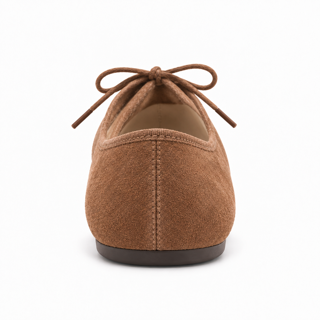 Brown suede lace up ballet flats rear view with low dark sole and soft suede texture