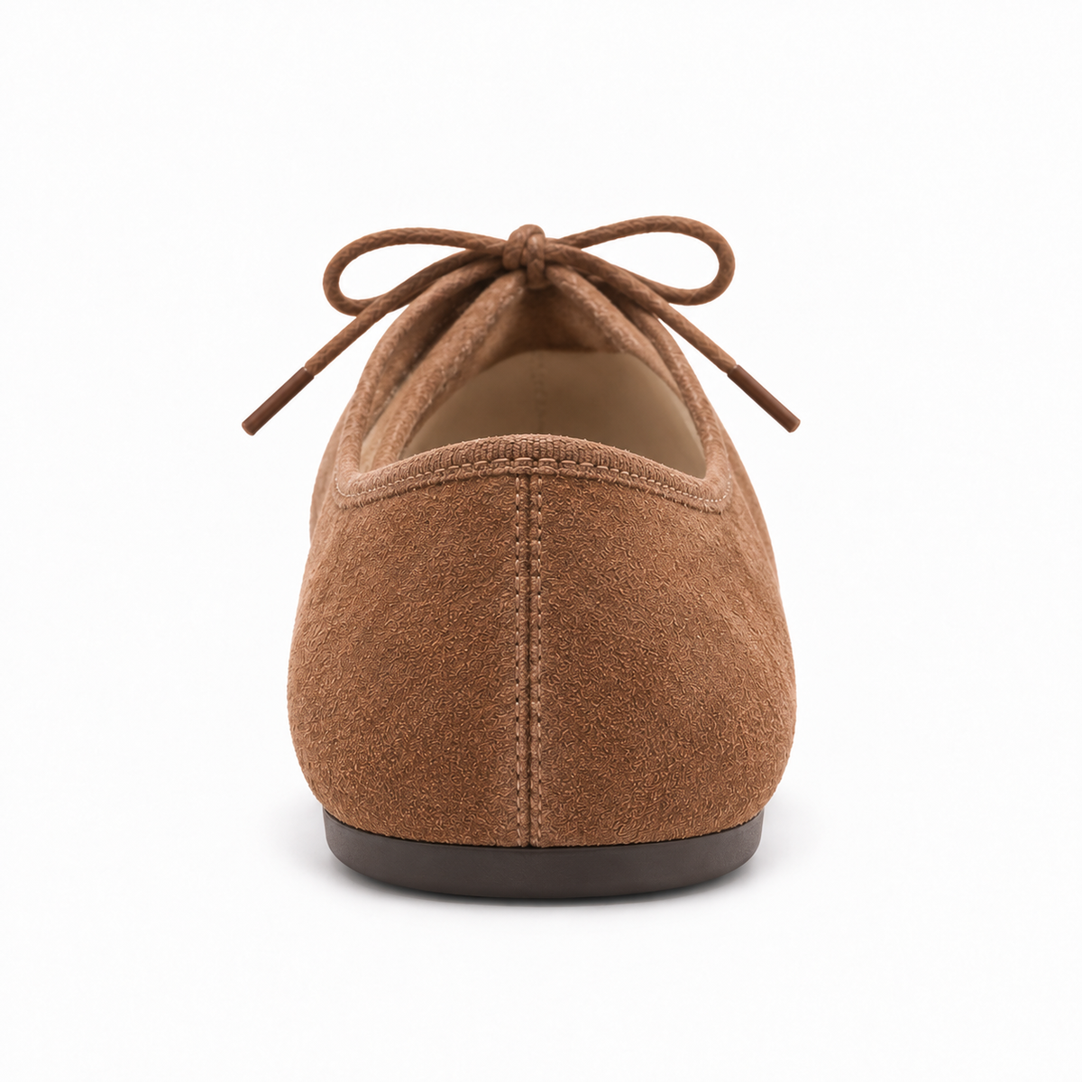 Brown suede lace up ballet flats rear view with low dark sole and soft suede texture