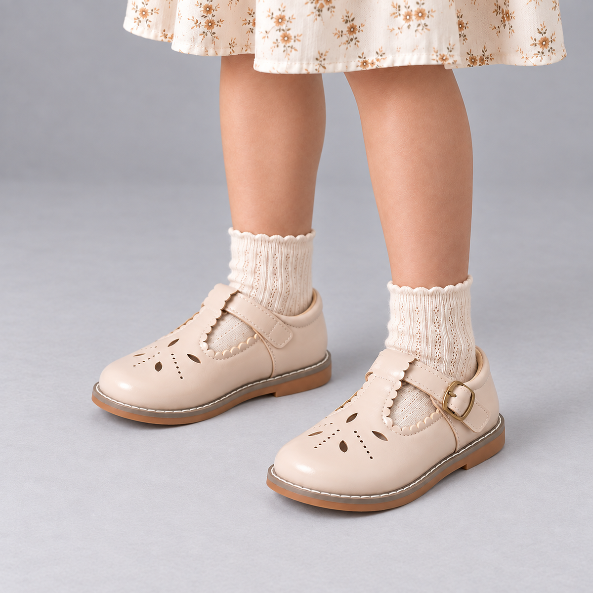 Girl wearing Beige Kids Mary Jane Breathable Ballet Flats with cream socks in premium studio photo