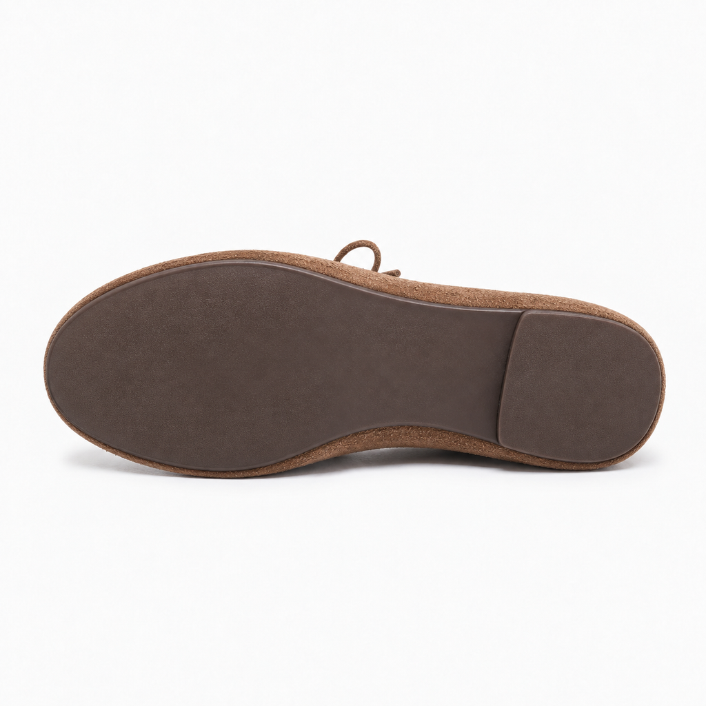 Brown suede lace up ballet flats sole view showing slim flat outsole and premium finish