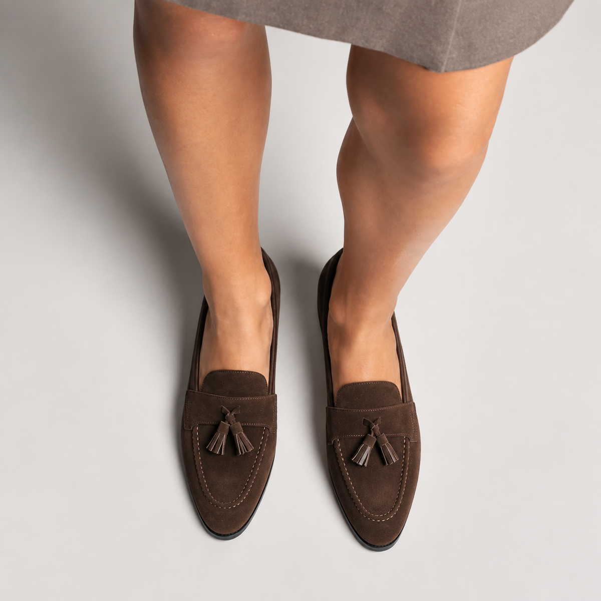 Brown suede tassel driving loafers worn by model - womens loafers