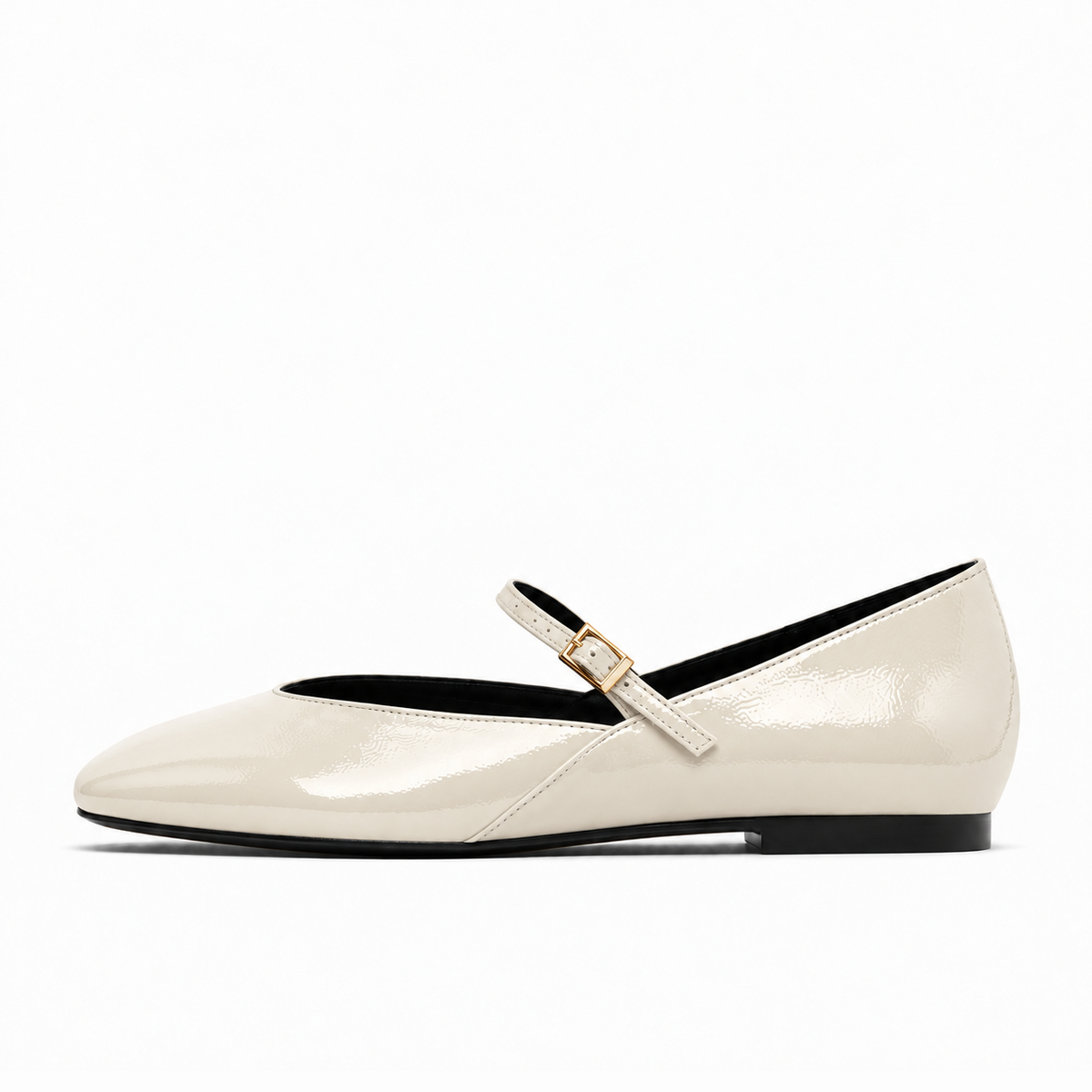 Beige womens patent round toe ballet flats side view with Mary Jane strap and gold buckle