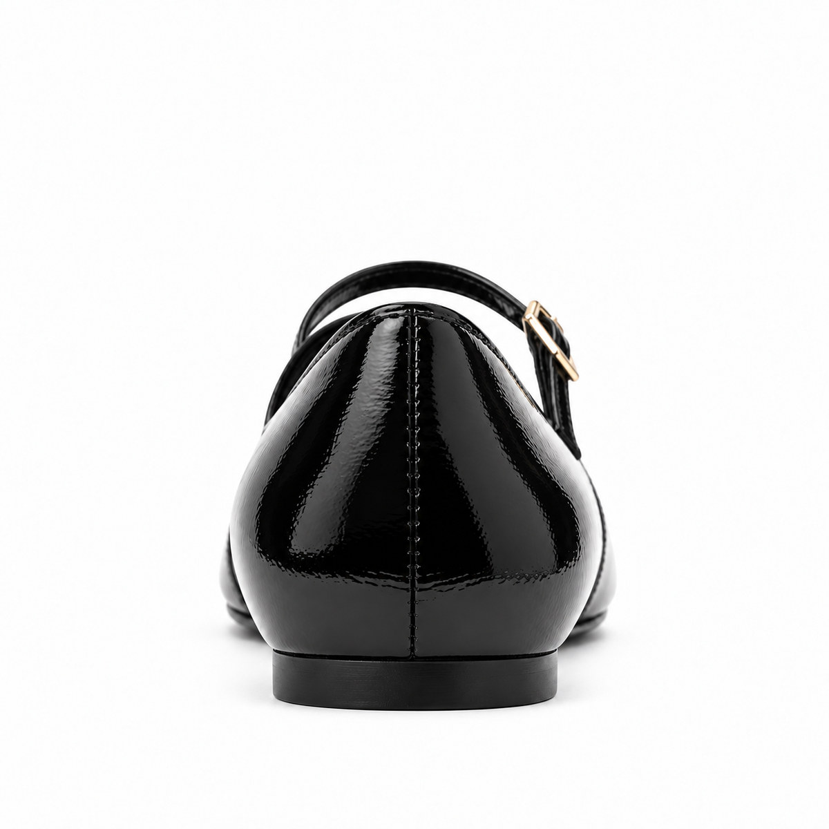 Black womens patent round toe ballet flats rear view showing low heel and glossy finish