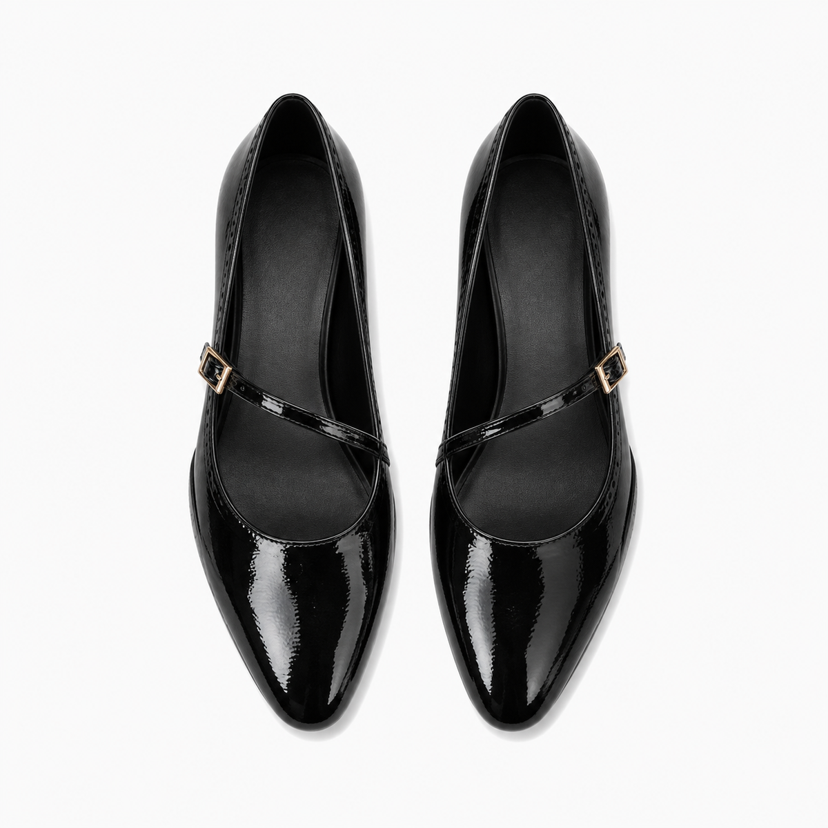 Pair of black womens patent round toe ballet flats top view with Mary Jane straps